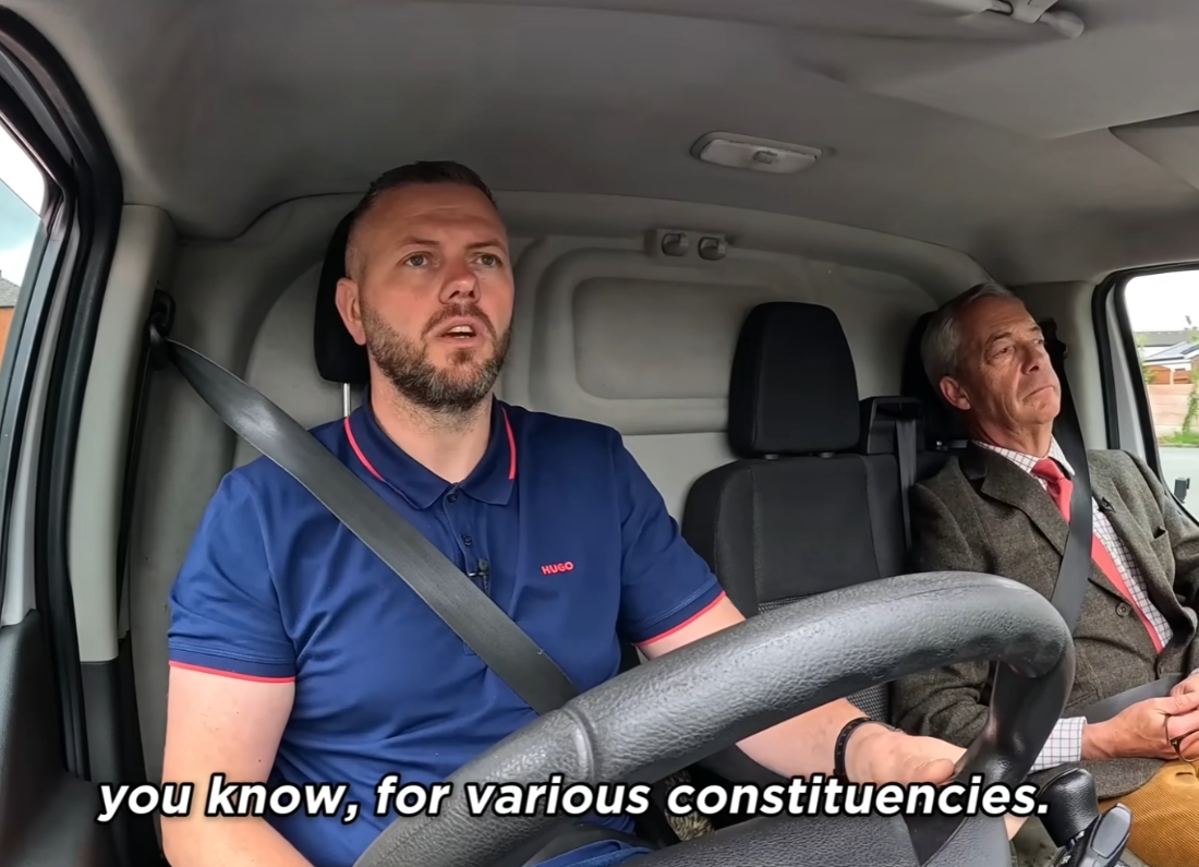 Reform UK leader Nigel Farage sits in the passenger seat of a van while Makerfield candidate Robert Kenyon drives during a filmed campaign discussion.