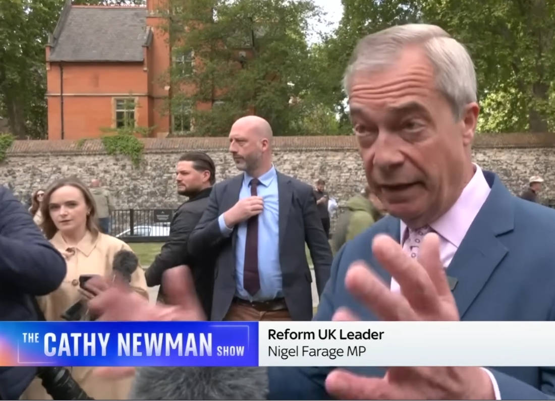 Nigel Farage speaks to reporters during an interview with Channel 4’s Cathy Newman ahead of polling day.