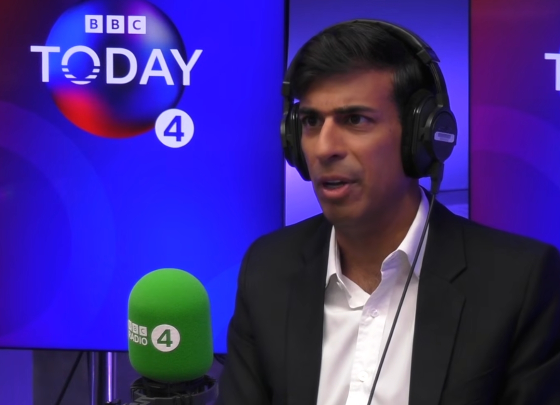 Former Prime Minister Rishi Sunak appears in a BBC Radio 4 studio wearing headphones during an interview on the Today programme.