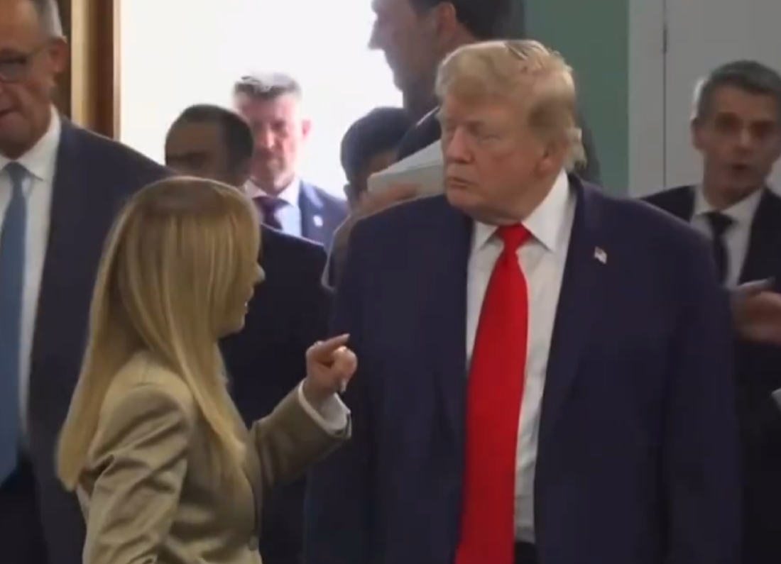 Italian Prime Minister Giorgia Meloni speaks with US President Donald Trump during a meeting at the G7 summit.