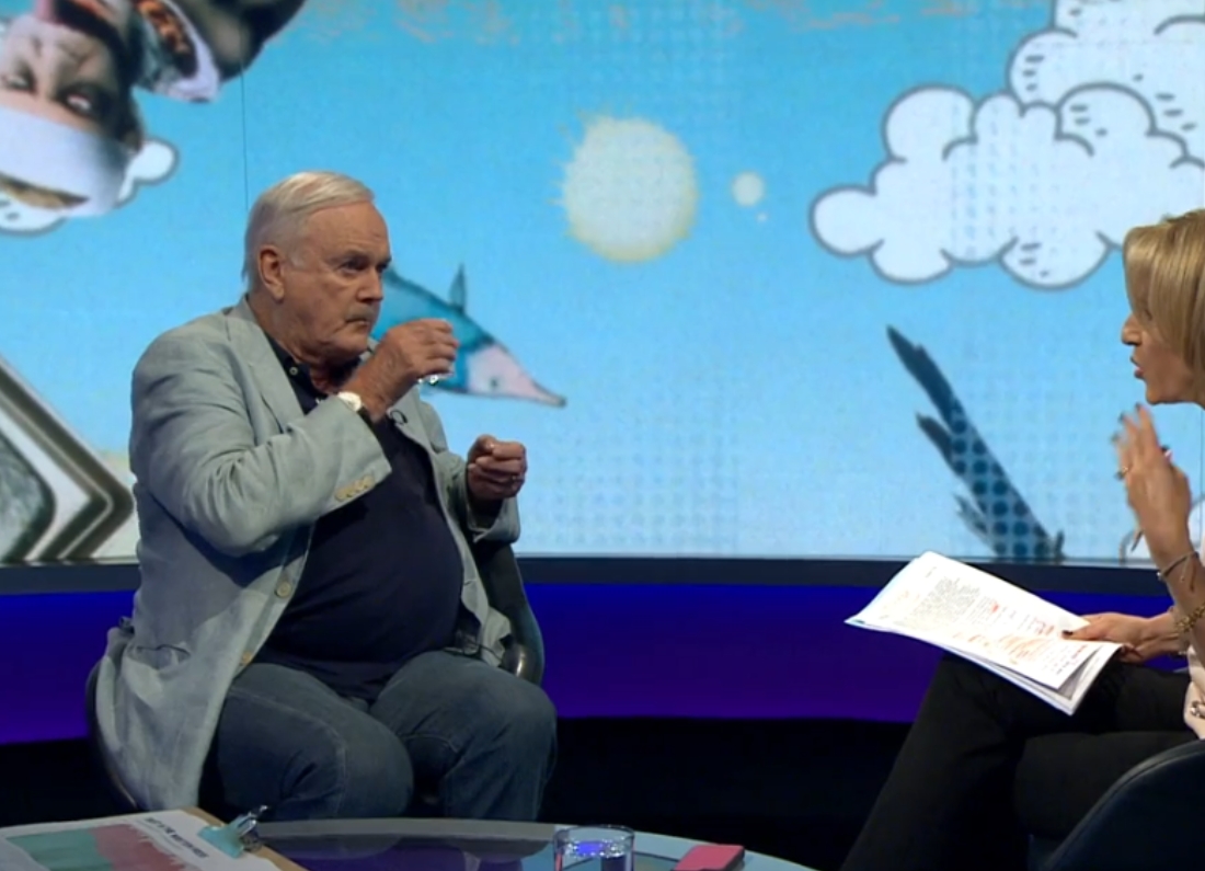 John Cleese sits opposite journalist Emily Maitlis during an interview on BBC Newsnight.