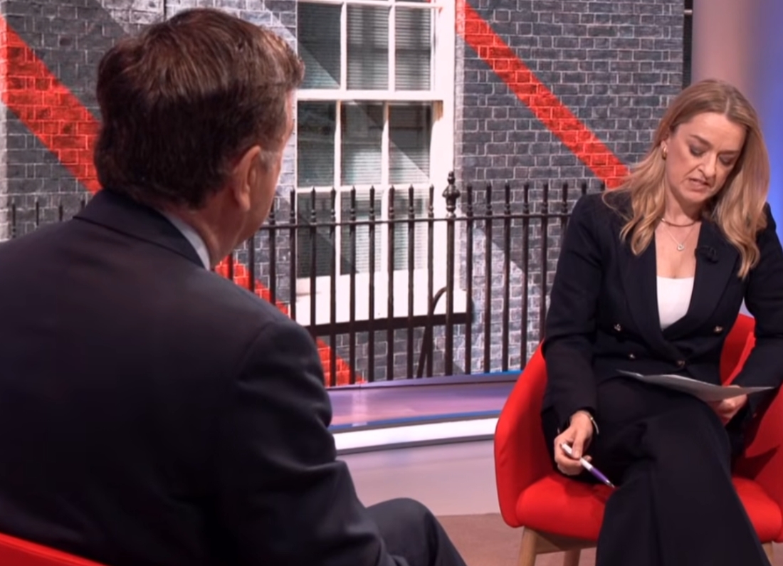 Laura Kuenssberg interviewing Conservative MP Mel Stride during a BBC politics programme, with a Downing Street backdrop behind them.