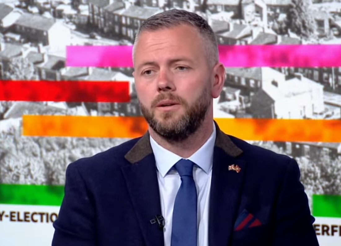 Reform UK representative Robert Kenyon speaks during a BBC political television interview.