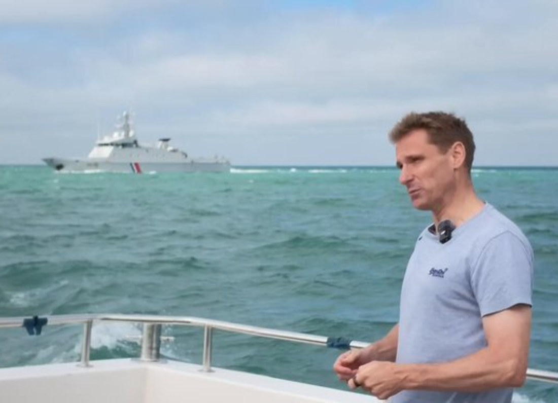 Conservative MP Chris Philp claims a French navy vessel fired warning shots near his boat in the Channel while he discussed the small boats crisis, though a former Border Force officer says it may simply have been a routine exercise.