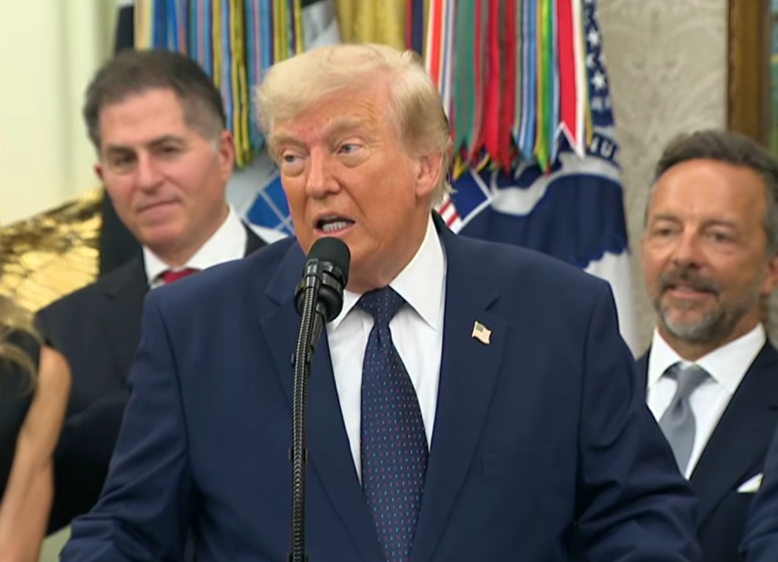 Donald Trump speaking at a White House microphone after FIFA suspended Folarin Balogun’s red card ban, allowing the US striker to play against Belgium.