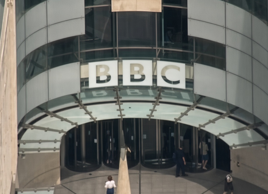 BBC headquarters at Broadcasting House in London, showing the BBC sign above the main entrance.
