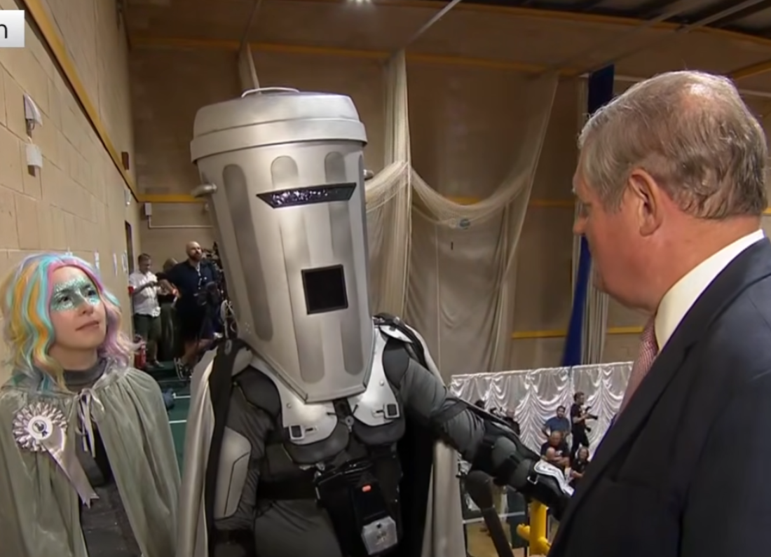 Count Binface speaking to Sky News reporter Jon Craig at the Clacton by-election count Image title: Count Binface responds to Nigel Farage after Clacton result